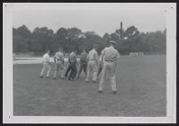 Photograph of Air Force ROTC cadets training on field
